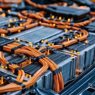 EV battery pack with orange high voltage cables